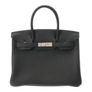 Pre-owned Leather handbags Hermès Vintage , Black , Dames