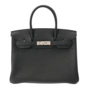 Pre-owned Leather handbags Hermès Vintage , Black , Dames