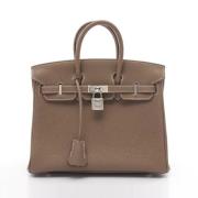 Pre-owned Leather handbags Hermès Vintage , Beige , Dames