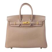 Pre-owned Leather handbags Hermès Vintage , Beige , Dames