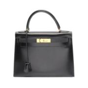 Pre-owned Leather handbags Hermès Vintage , Black , Dames