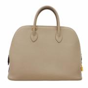 Pre-owned Leather handbags Hermès Vintage , Beige , Dames