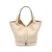 Pre-owned Leather totes Hermès Vintage , Beige , Dames