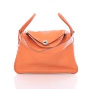 Pre-owned Leather handbags Hermès Vintage , Orange , Dames