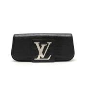 Pre-owned Leather clutches Louis Vuitton Vintage , Black , Dames