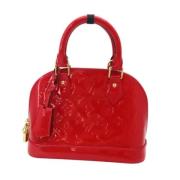 Pre-owned Leather handbags Louis Vuitton Vintage , Red , Dames