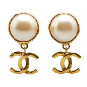 Pre-owned Metal earrings Chanel Vintage , Yellow , Dames