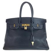 Pre-owned Leather handbags Hermès Vintage , Black , Dames