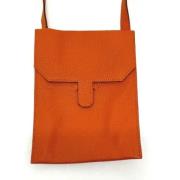 Pre-owned Canvas shoulder-bags Hermès Vintage , Orange , Dames