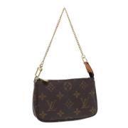 Pre-owned Canvas pouches Louis Vuitton Vintage , Brown , Dames