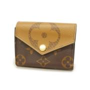 Pre-owned Fabric wallets Louis Vuitton Vintage , Brown , Dames