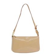 Pre-owned Leather pouches Louis Vuitton Vintage , Beige , Dames