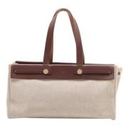 Pre-owned Canvas handbags Hermès Vintage , Brown , Heren