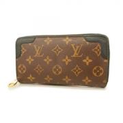 Pre-owned Fabric wallets Louis Vuitton Vintage , Brown , Dames