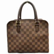 Pre-owned Fabric handbags Louis Vuitton Vintage , Brown , Dames