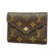 Pre-owned Fabric wallets Louis Vuitton Vintage , Brown , Dames