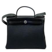 Pre-owned Canvas handbags Hermès Vintage , Black , Dames