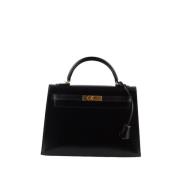 Pre-owned Leather handbags Hermès Vintage , Black , Dames