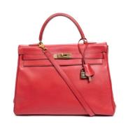 Pre-owned Leather handbags Hermès Vintage , Red , Dames