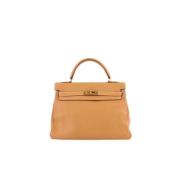 Pre-owned Leather handbags Hermès Vintage , Beige , Dames