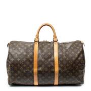 Pre-owned Canvas travel-bags Louis Vuitton Vintage , Brown , Dames