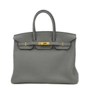 Pre-owned Leather handbags Hermès Vintage , Gray , Dames