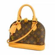 Pre-owned Fabric handbags Louis Vuitton Vintage , Brown , Dames