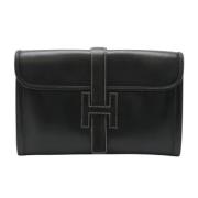 Pre-owned Leather clutches Hermès Vintage , Black , Dames