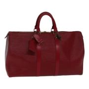 Pre-owned Leather handbags Louis Vuitton Vintage , Red , Dames