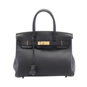 Pre-owned Leather handbags Hermès Vintage , Black , Dames