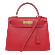 Pre-owned Leather handbags Hermès Vintage , Red , Dames