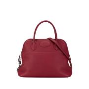 Pre-owned Leather handbags Hermès Vintage , Red , Dames