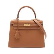 Pre-owned Leather handbags Hermès Vintage , Brown , Dames