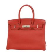 Pre-owned Leather handbags Hermès Vintage , Red , Dames