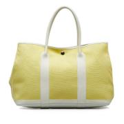 Pre-owned Canvas handbags Hermès Vintage , Yellow , Dames