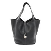 Pre-owned Leather handbags Hermès Vintage , Black , Dames