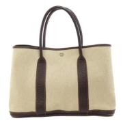 Pre-owned Canvas handbags Hermès Vintage , Beige , Dames