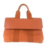 Pre-owned Canvas handbags Hermès Vintage , Orange , Dames