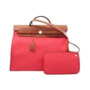 Pre-owned Canvas handbags Hermès Vintage , Pink , Dames