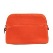 Pre-owned Cotton clutches Hermès Vintage , Orange , Dames