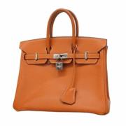 Pre-owned Leather handbags Hermès Vintage , Orange , Dames