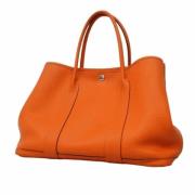 Pre-owned Leather handbags Hermès Vintage , Orange , Dames