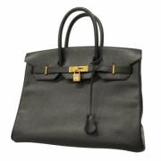 Pre-owned Leather handbags Hermès Vintage , Black , Dames