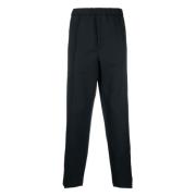 Midnight taps toelopende broek met elastische tailleband Jil Sander , ...