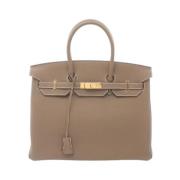 Pre-owned Leather handbags Hermès Vintage , Brown , Dames