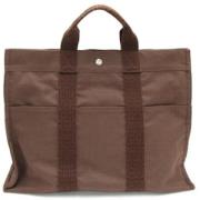 Pre-owned Canvas handbags Hermès Vintage , Brown , Dames