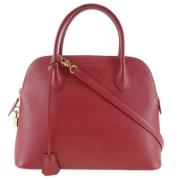 Pre-owned Leather handbags Hermès Vintage , Red , Dames