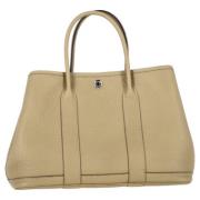 Pre-owned Leather handbags Hermès Vintage , Beige , Heren