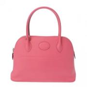 Pre-owned Leather handbags Hermès Vintage , Pink , Dames