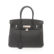 Pre-owned Leather handbags Hermès Vintage , Black , Dames